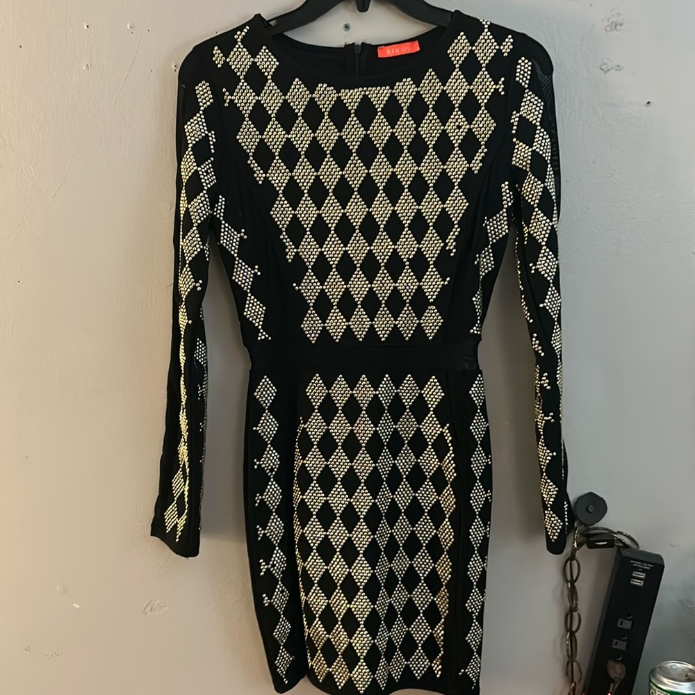 Black and gold dress with see through spots